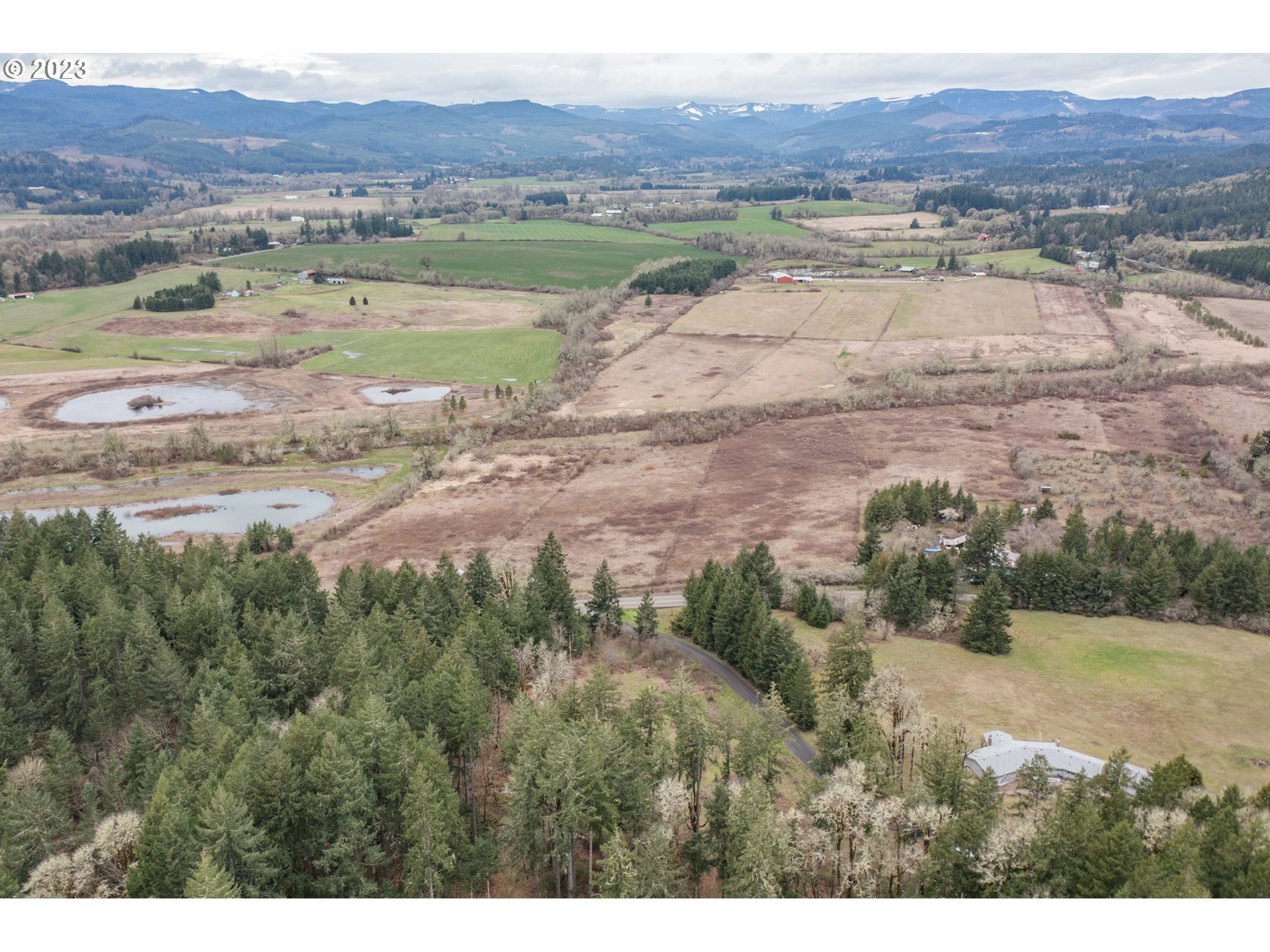 5891 Kings Ridge Road, Unit 1 Dallas, OR 97338 - Photo 24 of 48 a view of lake with mountain