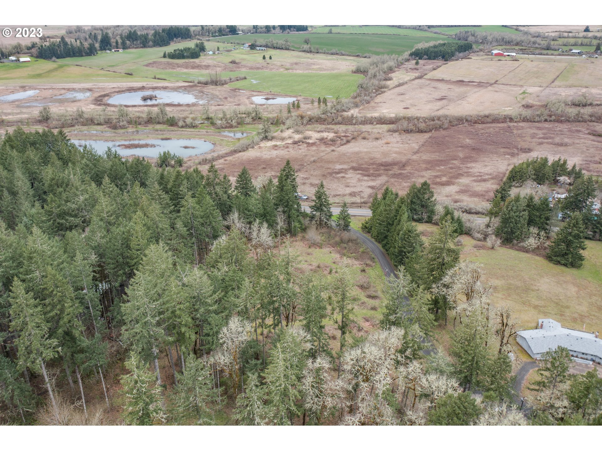 5891 Kings Ridge Road, Unit 1 Dallas, OR 97338 - Photo 29 of 48 a view of an outdoor space with a lake view