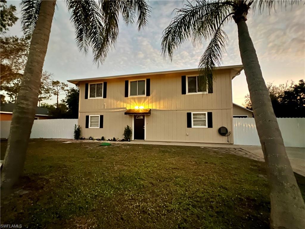 8430 Wren Road Fort Myers, FL 33967 - Photo 1 of 50 8430 Wren Rd. View of front of house with a yard and a patio