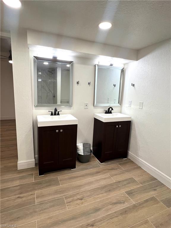 8430 Wren Road Fort Myers, FL 33967 - Photo 20 of 50 En-suite with dual sinks