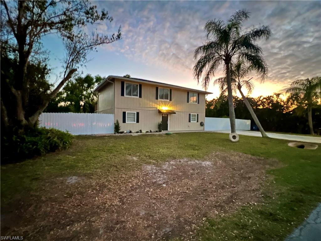 8430 Wren Road Fort Myers, FL 33967 - Photo 2 of 50 8430 Wren Rd. View of front of house with a yard