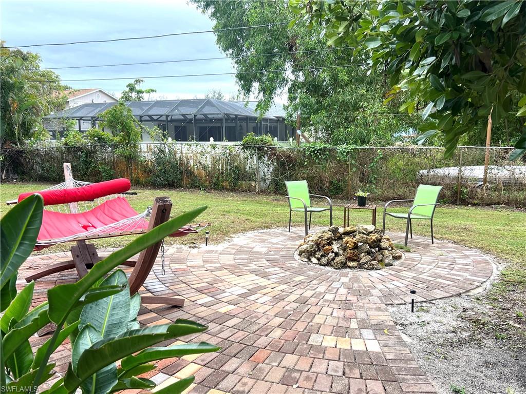 8430 Wren Road Fort Myers, FL 33967 - Photo 39 of 50 Pavers fire pit/sitting area