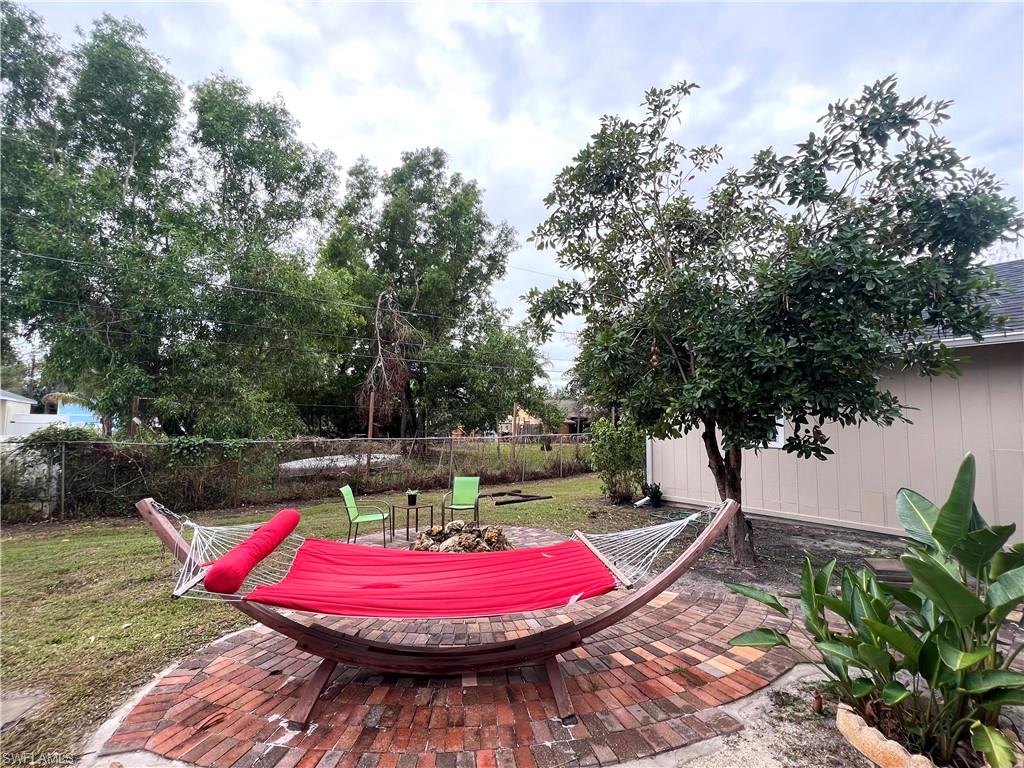 8430 Wren Road Fort Myers, FL 33967 - Photo 40 of 50 Pavers fire pit/sitting area
