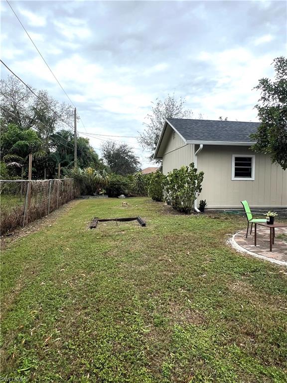 8430 Wren Road Fort Myers, FL 33967 - Photo 45 of 50 Yard with built-in horseshoe game