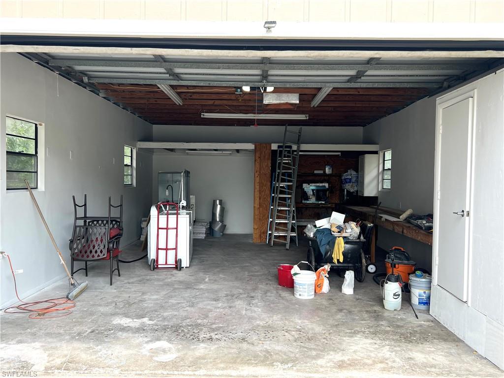 8430 Wren Road Fort Myers, FL 33967 - Photo 46 of 50 Oversized 20x30 garage with half bath