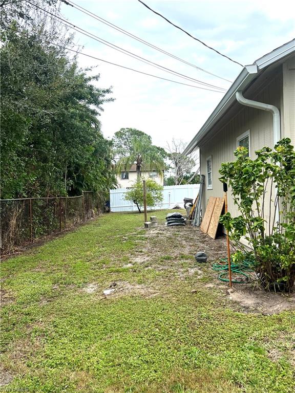 8430 Wren Road Fort Myers, FL 33967 - Photo 49 of 50 Right side of yard back view