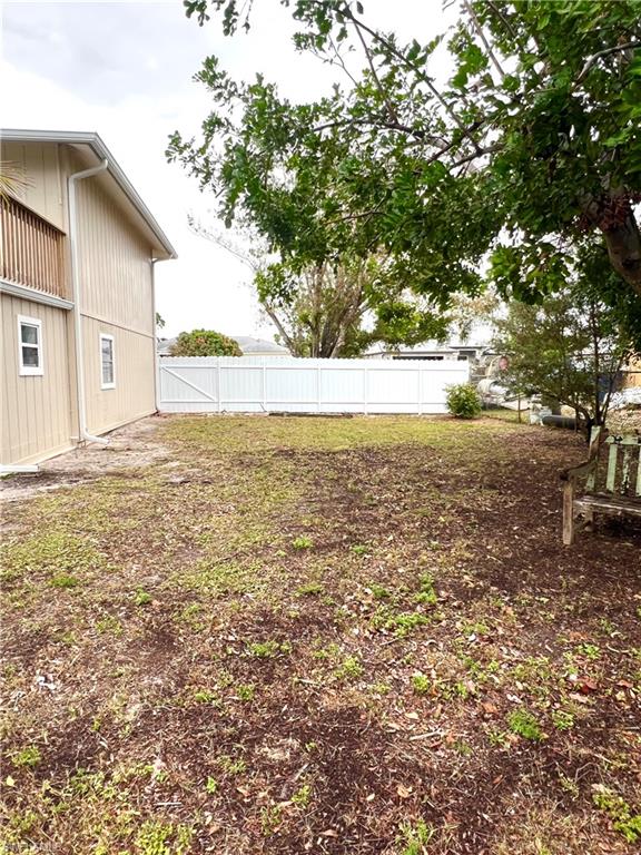 8430 Wren Road Fort Myers, FL 33967 - Photo 50 of 50 Left side of yard back view