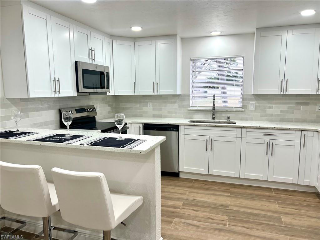 8430 Wren Road Fort Myers, FL 33967 - Photo 9 of 50 Remodeled kitchen and breakfast bar