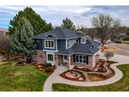 a kitchen with stainless steel appliances granite countertop sink stove top oven and cabinets