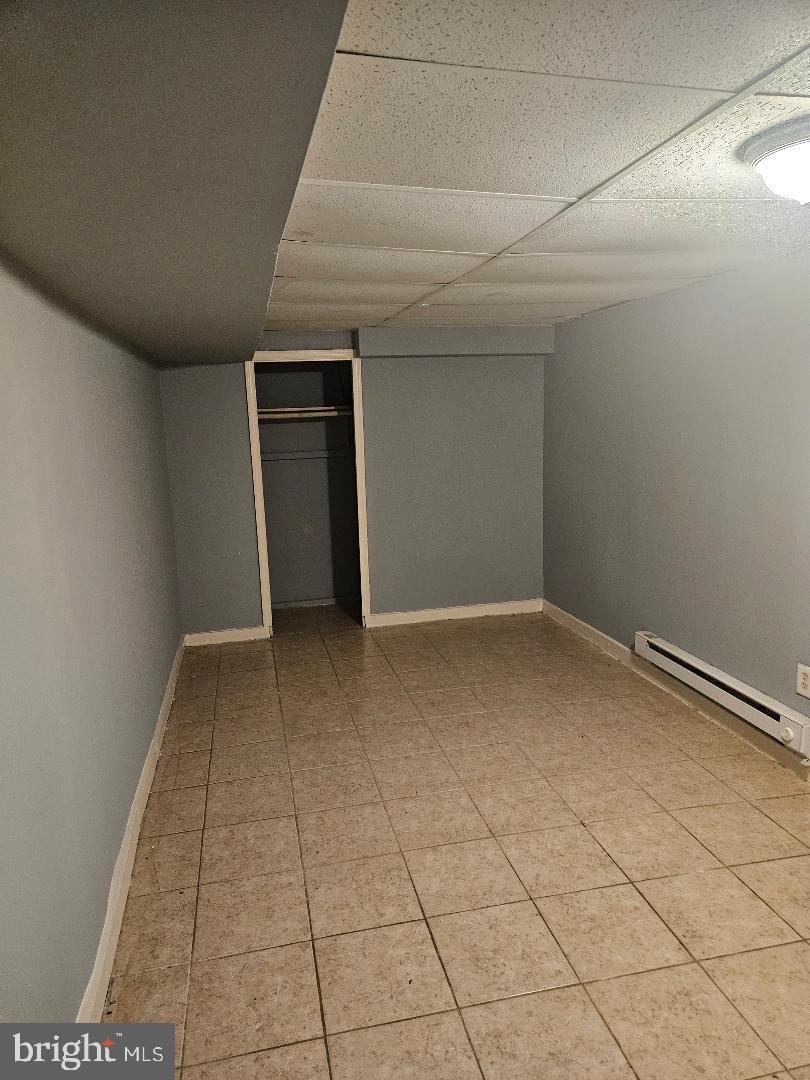 825 Delafield Place Northwest Washington, DC 20011 - Photo 4 of 25 an empty room with a bench