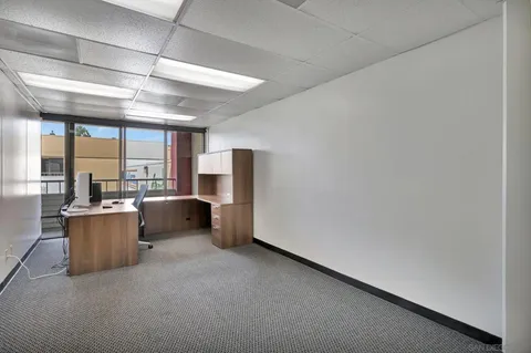 a view of a kitchen from the hallway