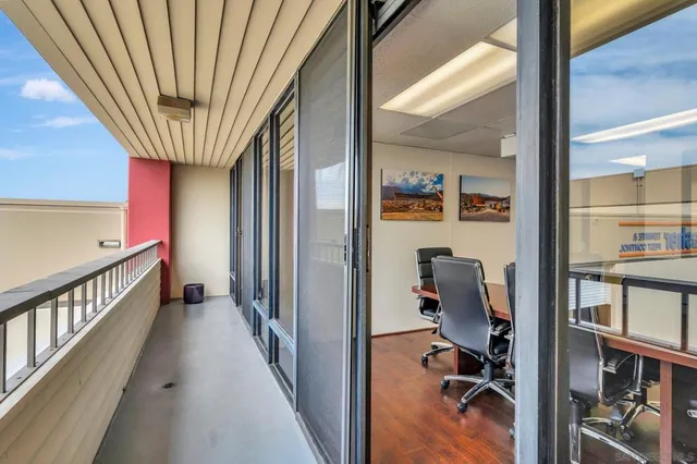 a view of kitchen and kitchen with wooden floor
