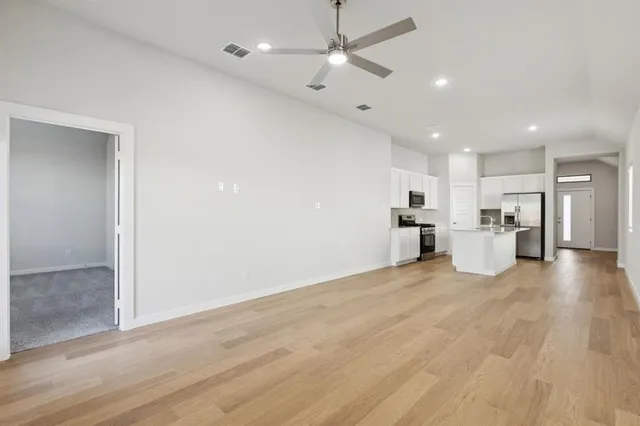 a view of an empty room and window