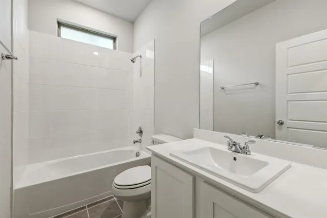 a bathroom with 2 sink and a mirror