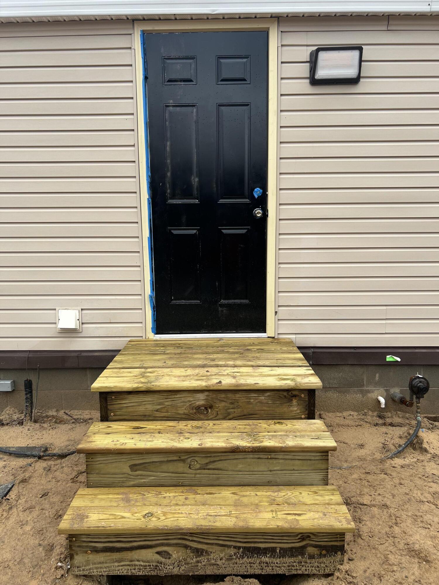 15734 Hall Road Bailey, MI 49303 - Photo 19 of 25 Back door