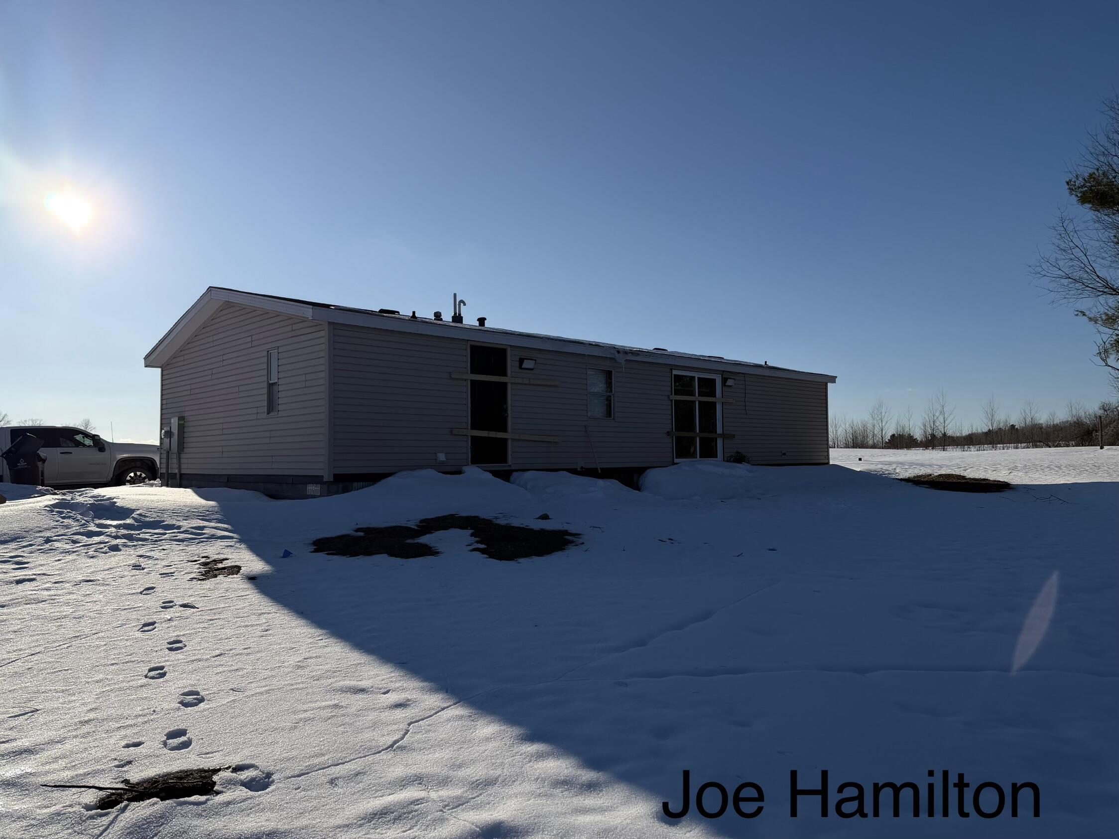 15734 Hall Road Bailey, MI 49303 - Photo 8 of 25 Back of home