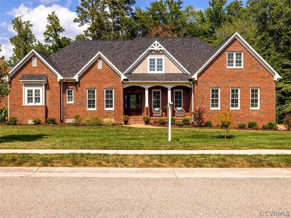 13536 Kelham Road Midlothian, VA 23113 - Photo 1 of 49 a front view of a house with a yard