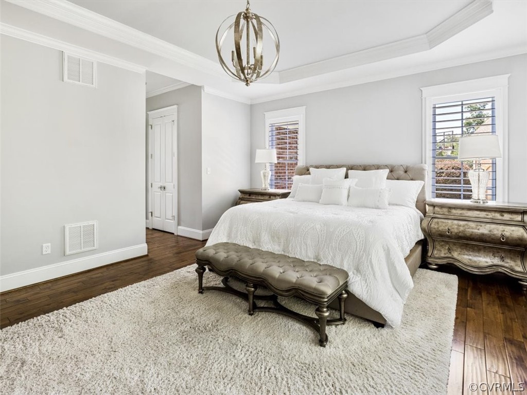13536 Kelham Road Midlothian, VA 23113 - Photo 21 of 49 a bedroom with a bed a chandelier and a window