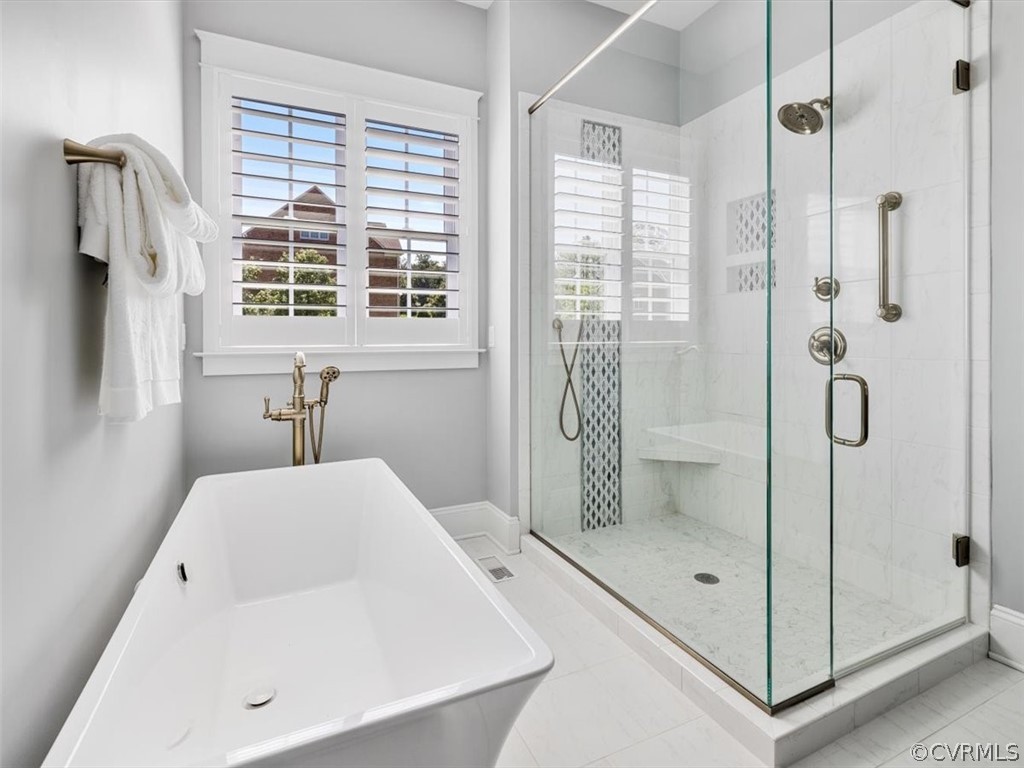 13536 Kelham Road Midlothian, VA 23113 - Photo 23 of 49 a bathroom with a tub and a shower