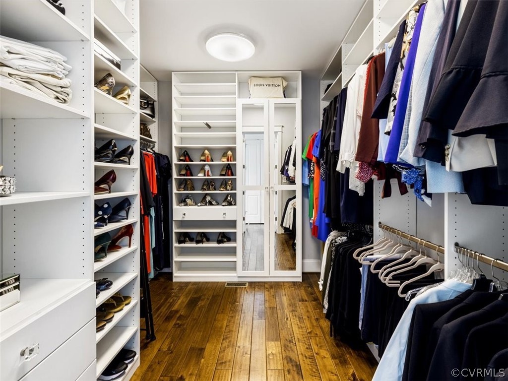 13536 Kelham Road Midlothian, VA 23113 - Photo 27 of 49 a view of walk in closet with clothes and shoes