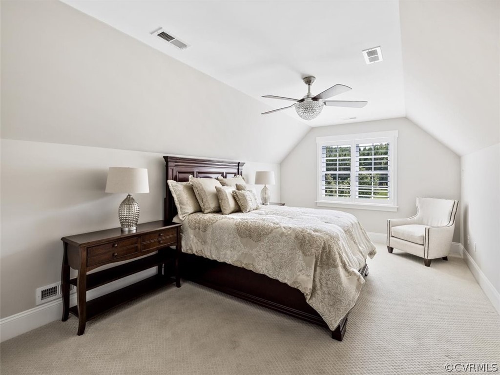 13536 Kelham Road Midlothian, VA 23113 - Photo 32 of 49 a bedroom with a bed and a chandelier