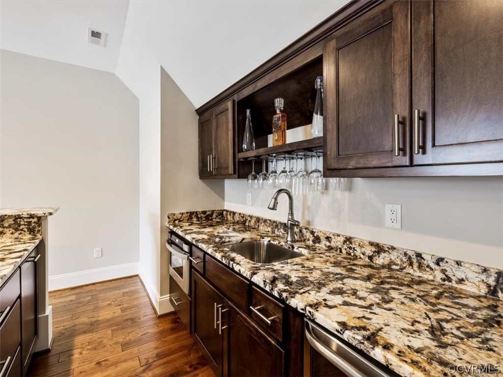 13536 Kelham Road Midlothian, VA 23113 - Photo 35 of 49 a kitchen with stainless steel appliances granite countertop a stove and a microwave