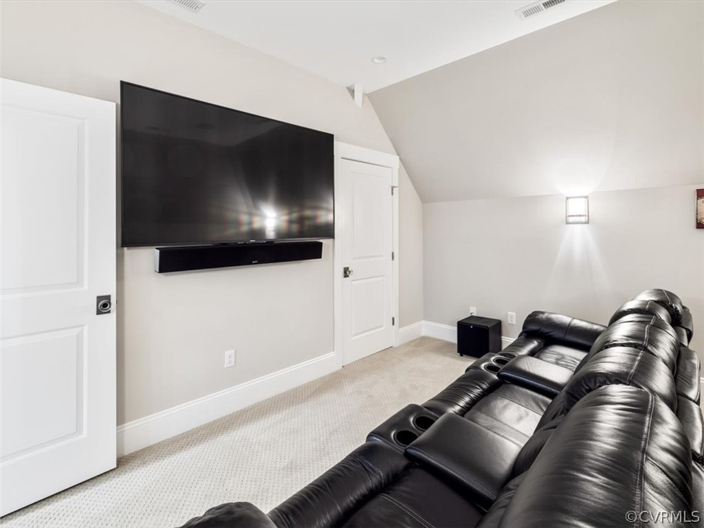 13536 Kelham Road Midlothian, VA 23113 - Photo 41 of 49 a living room with furniture and a flat screen tv