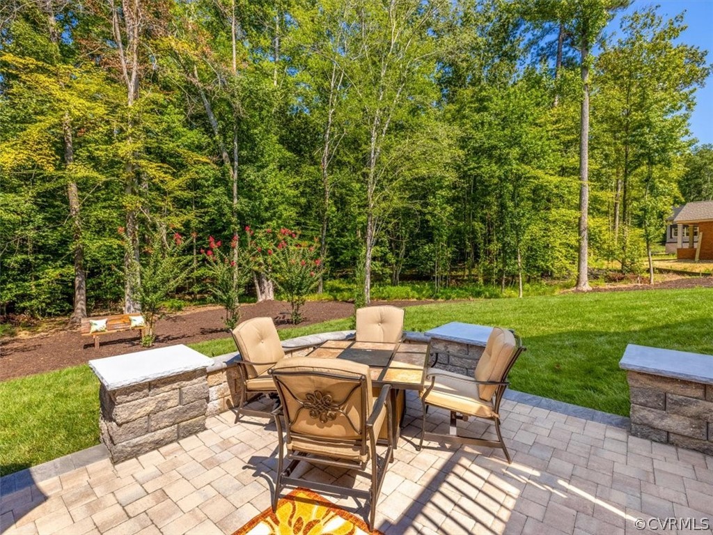 13536 Kelham Road Midlothian, VA 23113 - Photo 46 of 49 a view of a patio with a yard