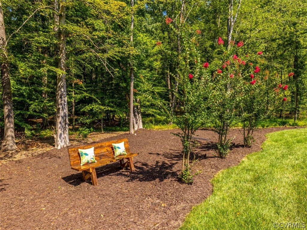 13536 Kelham Road Midlothian, VA 23113 - Photo 47 of 49 an outdoor sitting area with couch and wooden fence