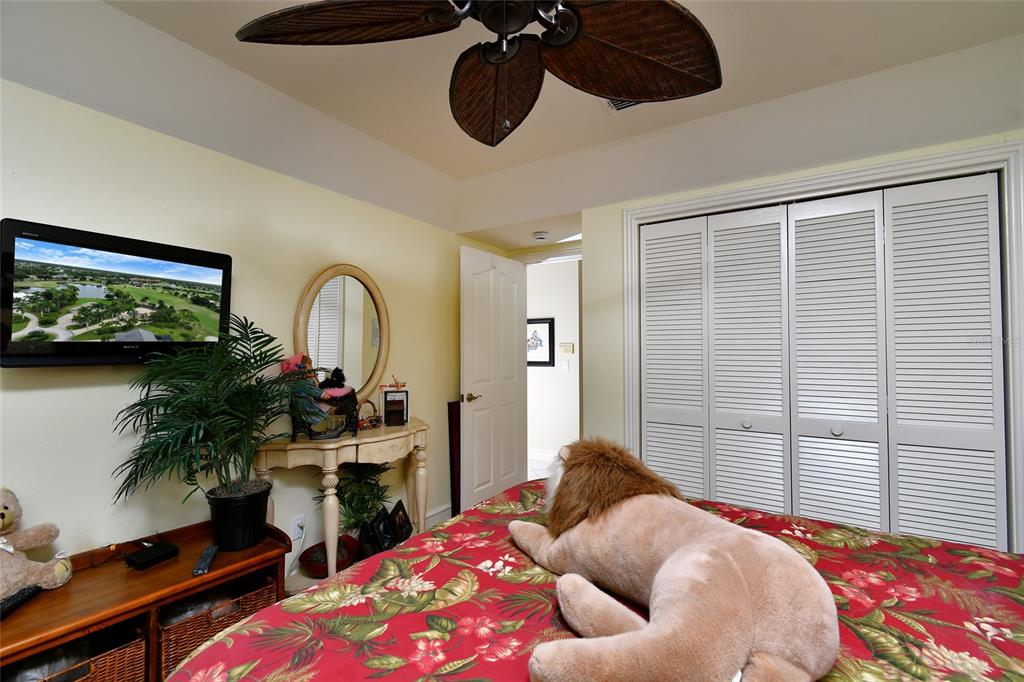 6030 Key Largo Circle Punta Gorda, FL 33955 - Photo 22 of 44 a bedroom with bed and a potted plant