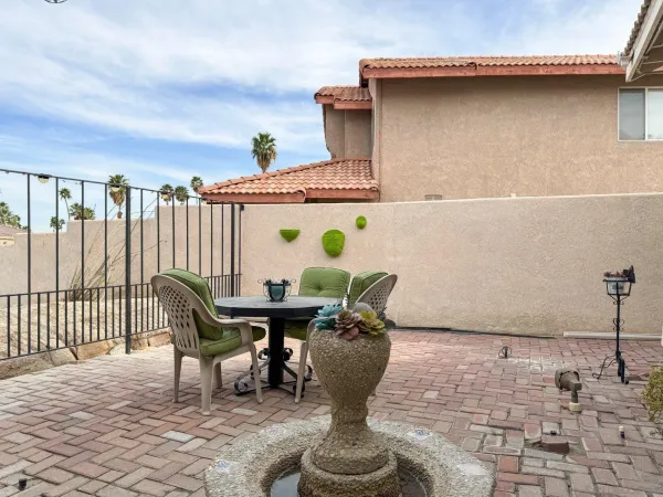 a outdoor dining space with furniture