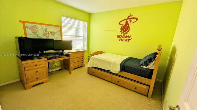 a bathroom with a sink toilet vanity and shower