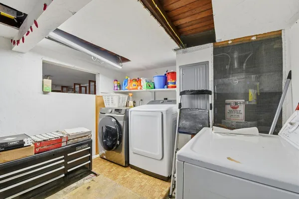 a utility room with dryer and washer