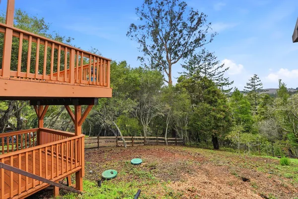 a view of a porch with a backyard