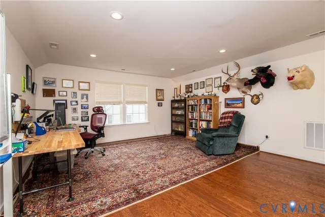 a view of a workspace with furniture