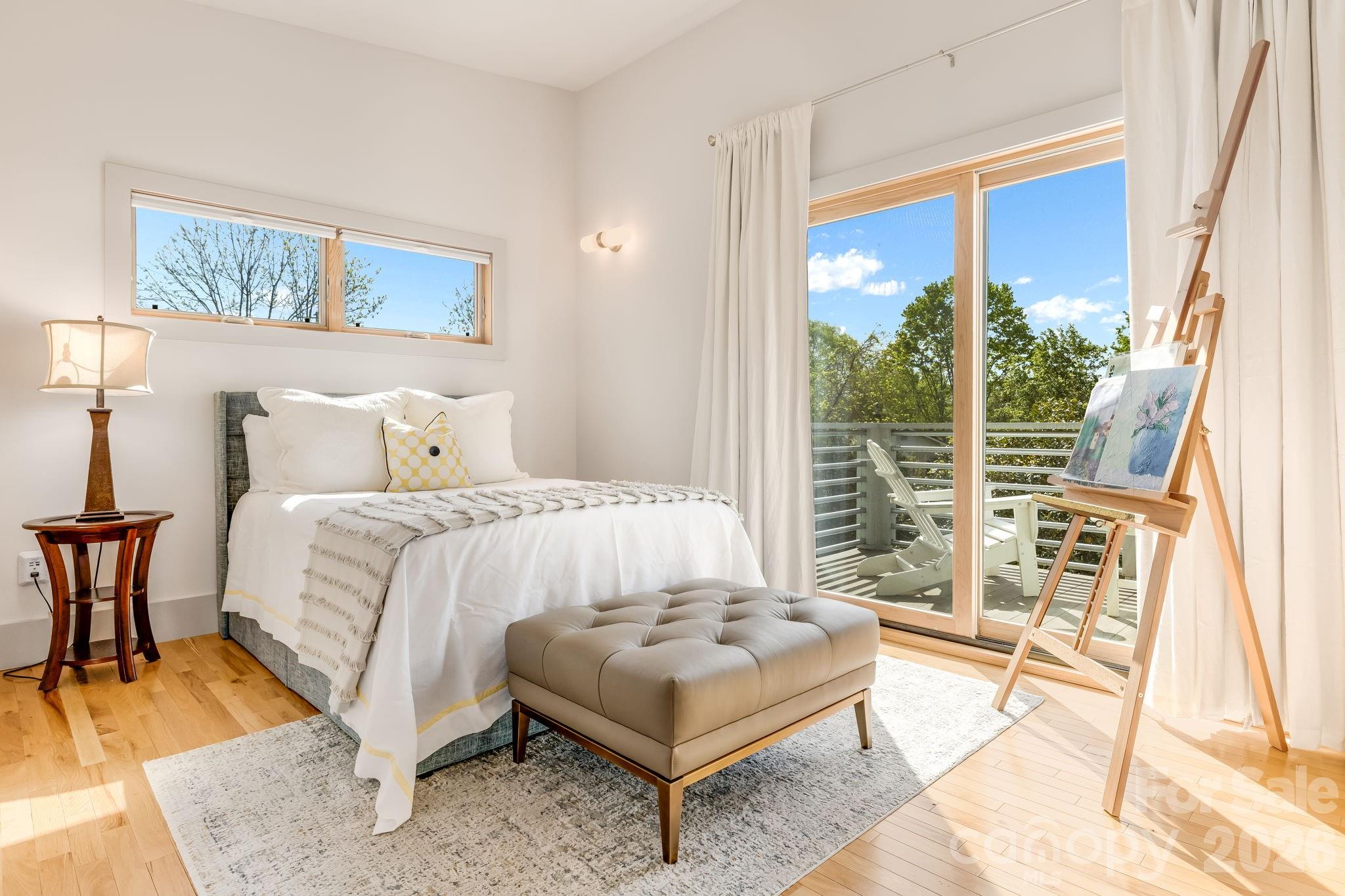 14 Sulphur Springs Road Asheville, NC 28806 - Photo 12 of 29 a bedroom with a bed and a large window