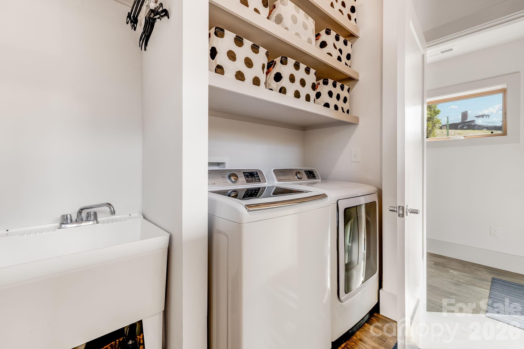 14 Sulphur Springs Road Asheville, NC 28806 - Photo 17 of 29 a utility room with dryer and washer