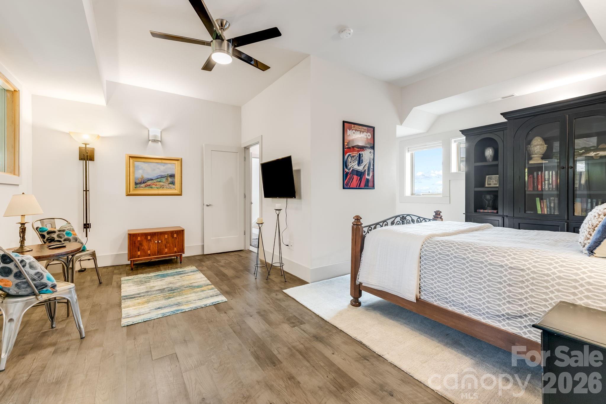 14 Sulphur Springs Road Asheville, NC 28806 - Photo 18 of 29 a bedroom with a bed and a flat screen tv