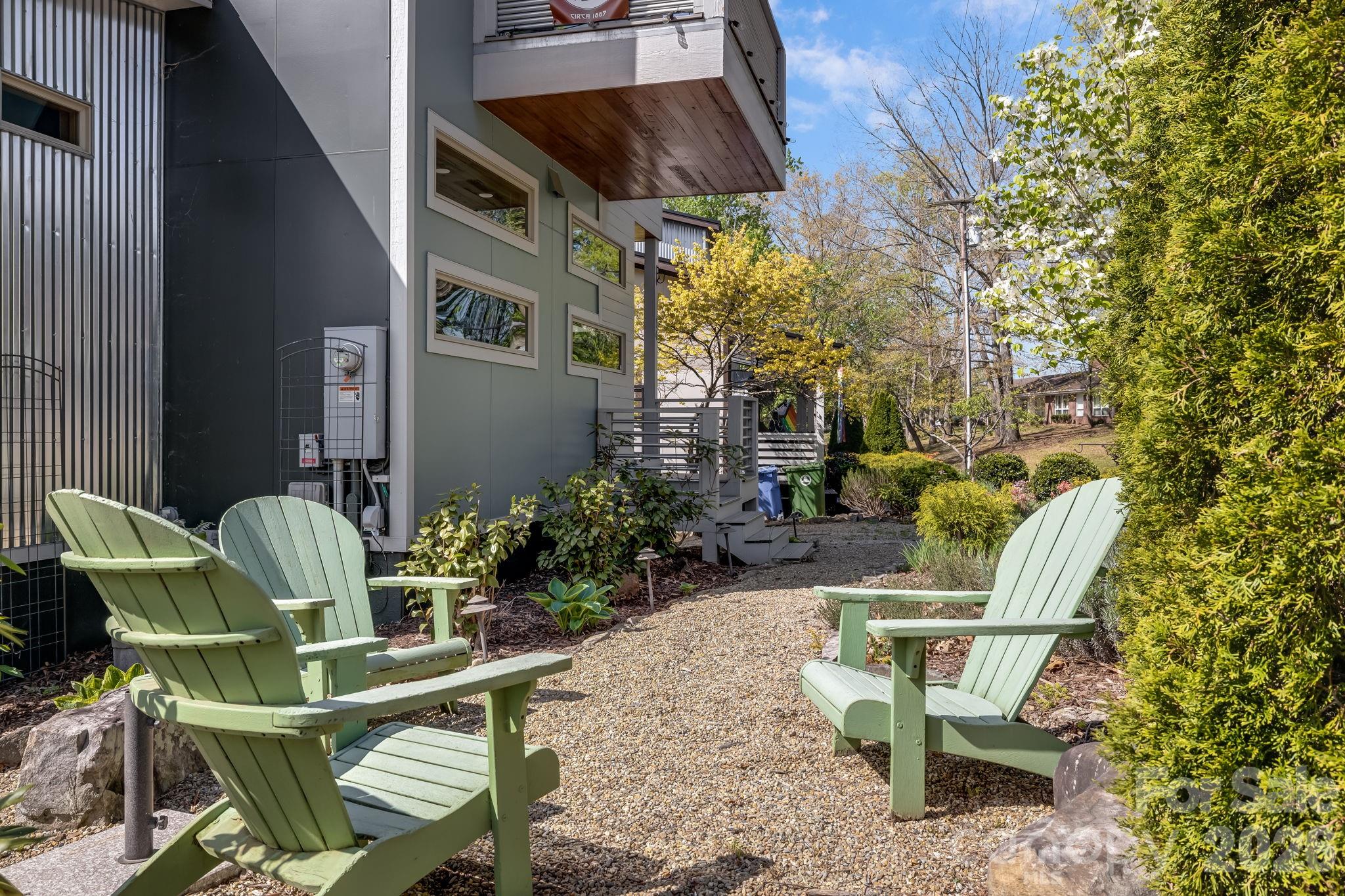 14 Sulphur Springs Road Asheville, NC 28806 - Photo 20 of 29 a view of backyard with outdoor seating and plants