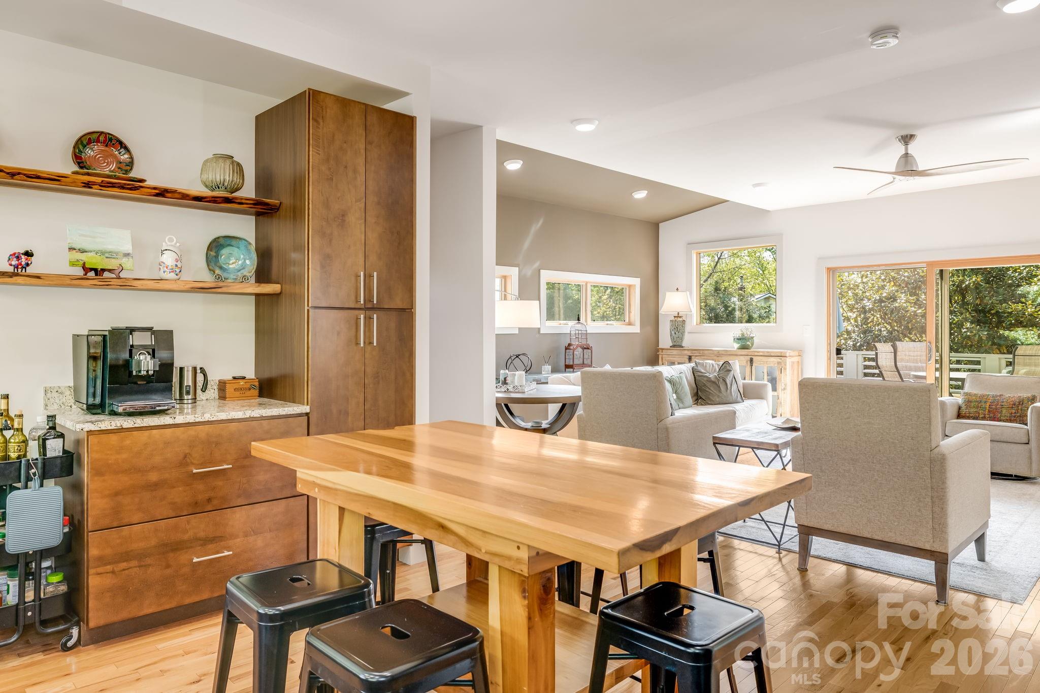 14 Sulphur Springs Road Asheville, NC 28806 - Photo 10 of 29 a view of a dining room with furniture and a floor to ceiling window