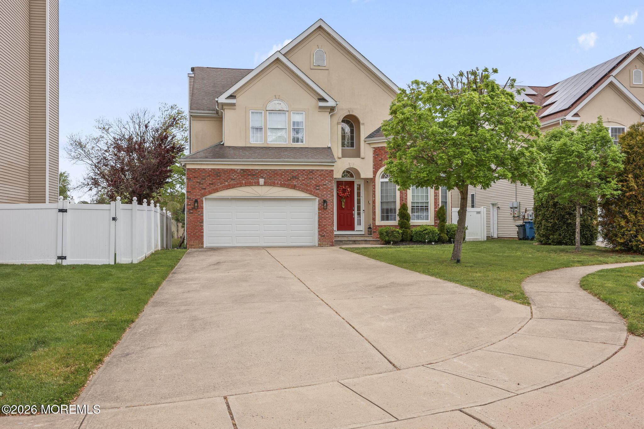 29 Chad Lane Howell, NJ 07731 - Photo 1 of 44 a front view of a house with a yard and trees
