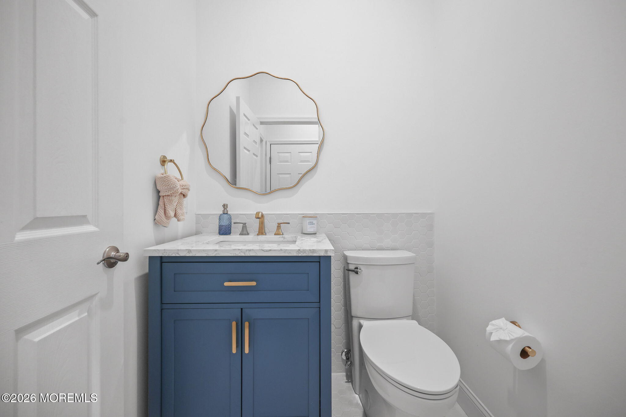 29 Chad Lane Howell, NJ 07731 - Photo 21 of 44 a bathroom with a toilet a sink and mirror