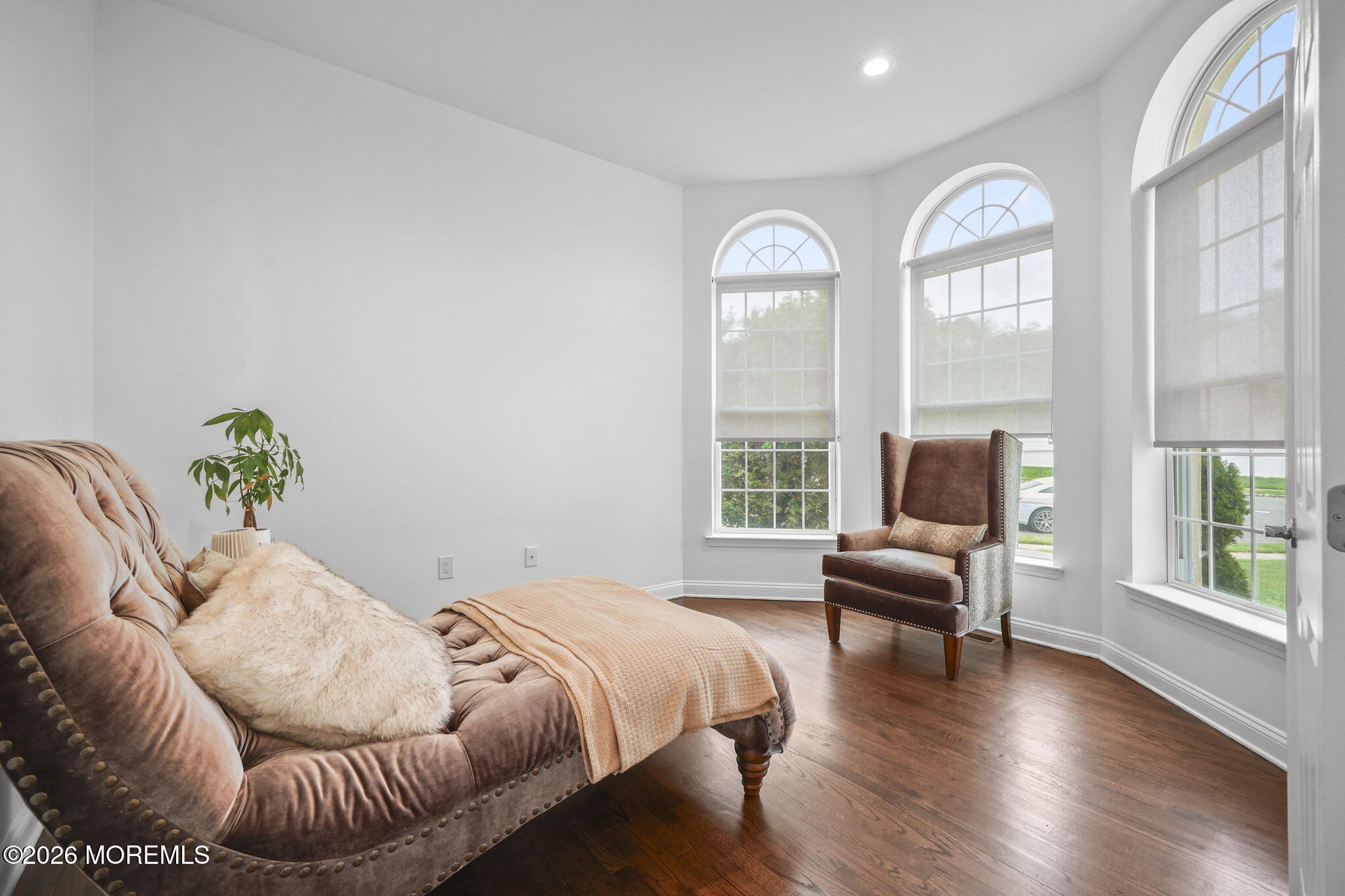 29 Chad Lane Howell, NJ 07731 - Photo 7 of 44 a bedroom with a bed and a large window