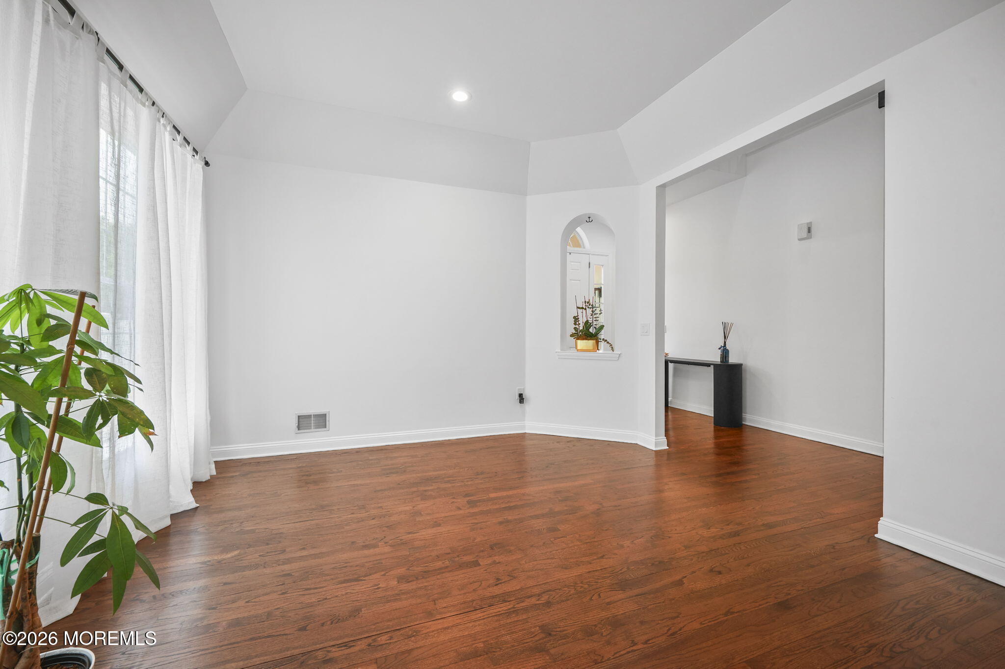 29 Chad Lane Howell, NJ 07731 - Photo 9 of 44 a view of an empty room with a window
