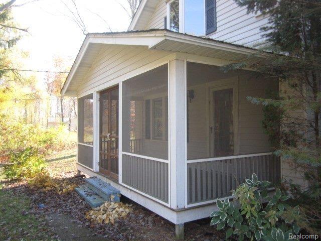 6491 Holland Road Algonac, MI 48001 - Photo 9 of 12 front porch.jpg