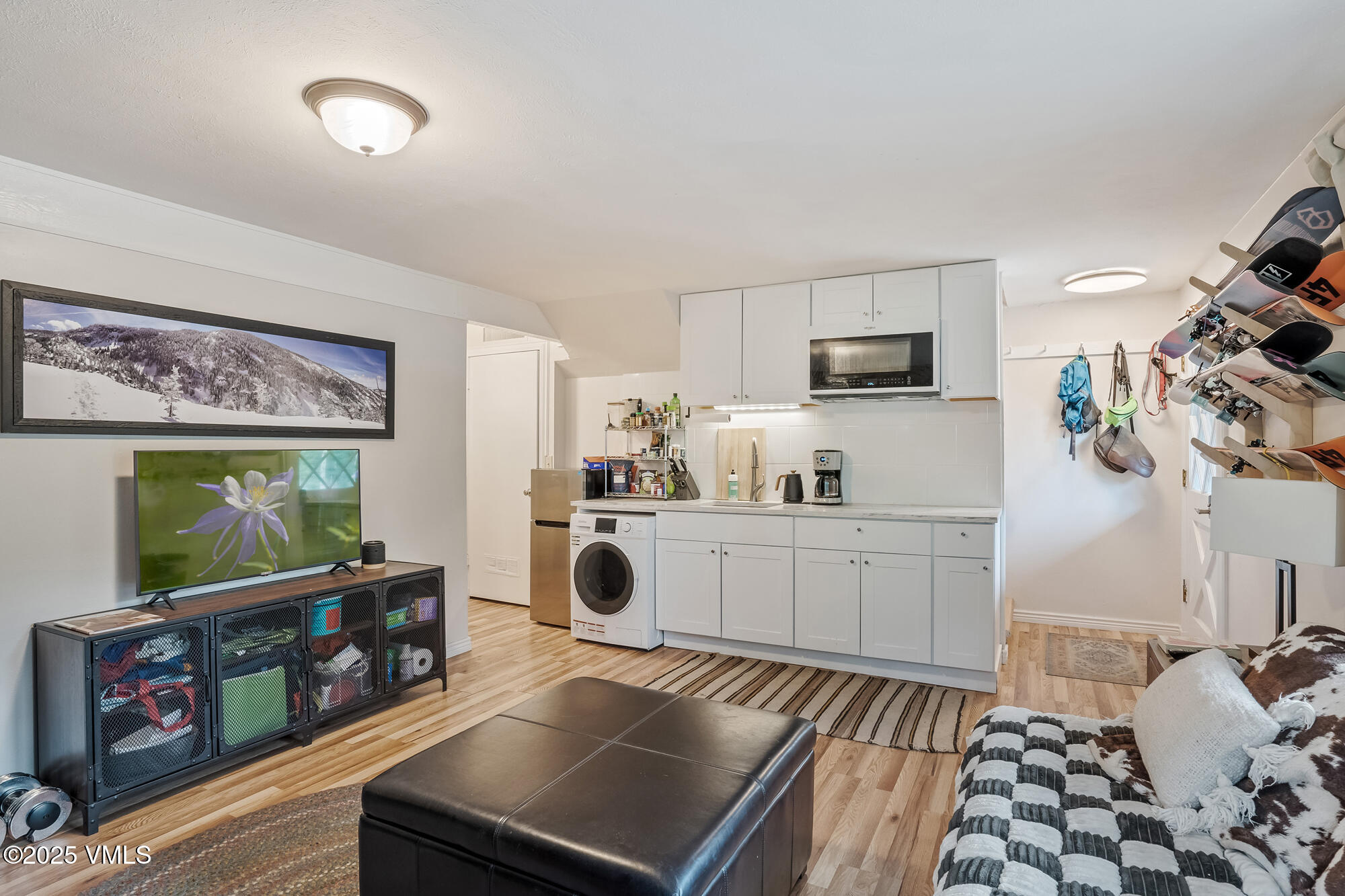 2487 Chamonix Lane, Unit F1 Vail, CO 81657 - Photo 13 of 27 a kitchen with sink microwave and stove