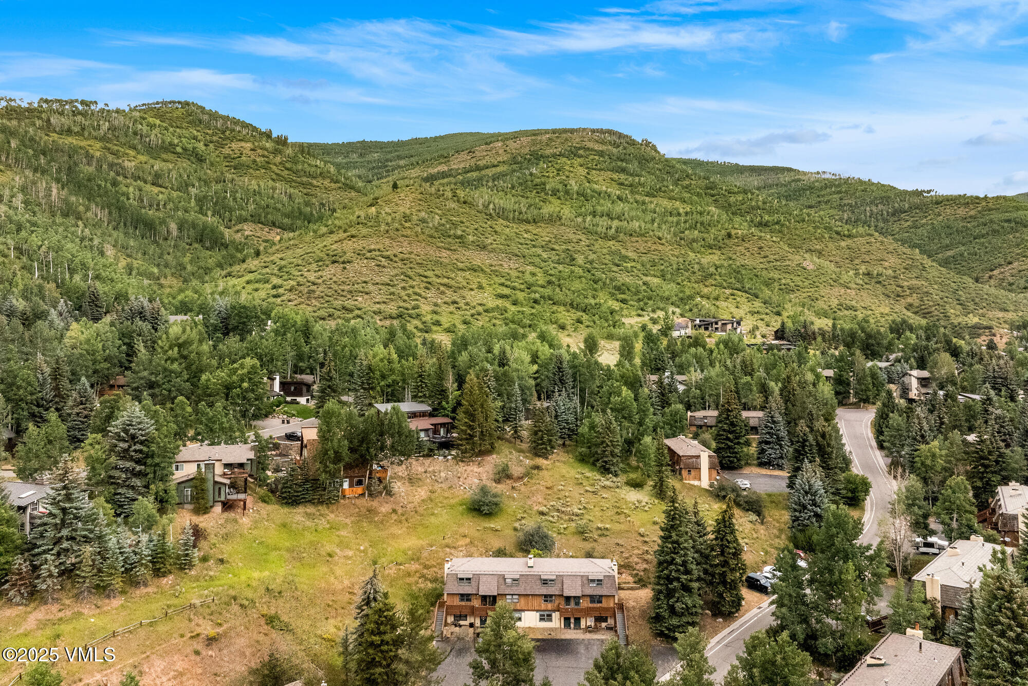 2487 Chamonix Lane, Unit F1 Vail, CO 81657 - Photo 26 of 27 a view of a field with an ocean