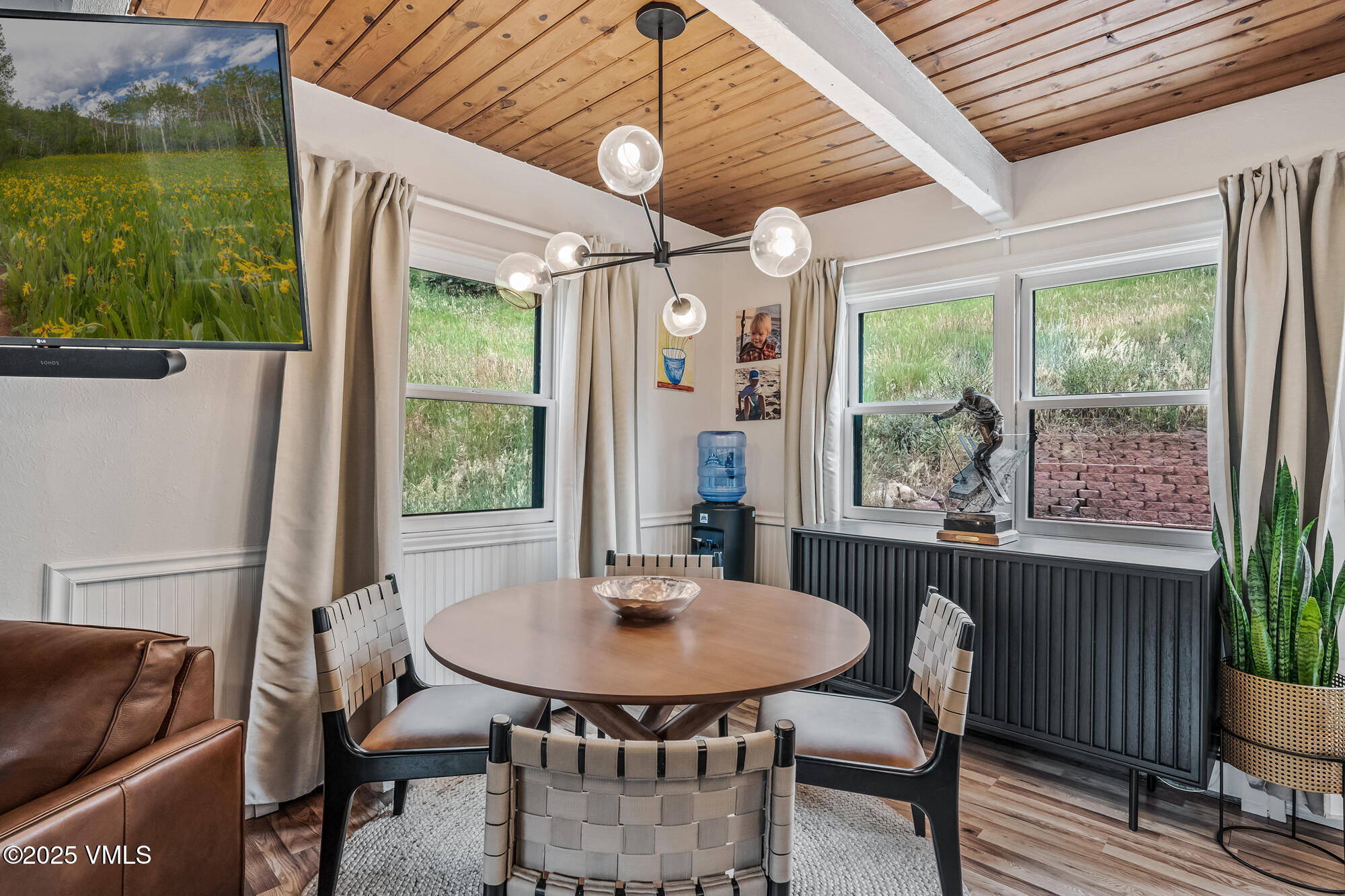 2487 Chamonix Lane, Unit F1 Vail, CO 81657 - Photo 4 of 27 a view of a dining room with furniture window and outside view