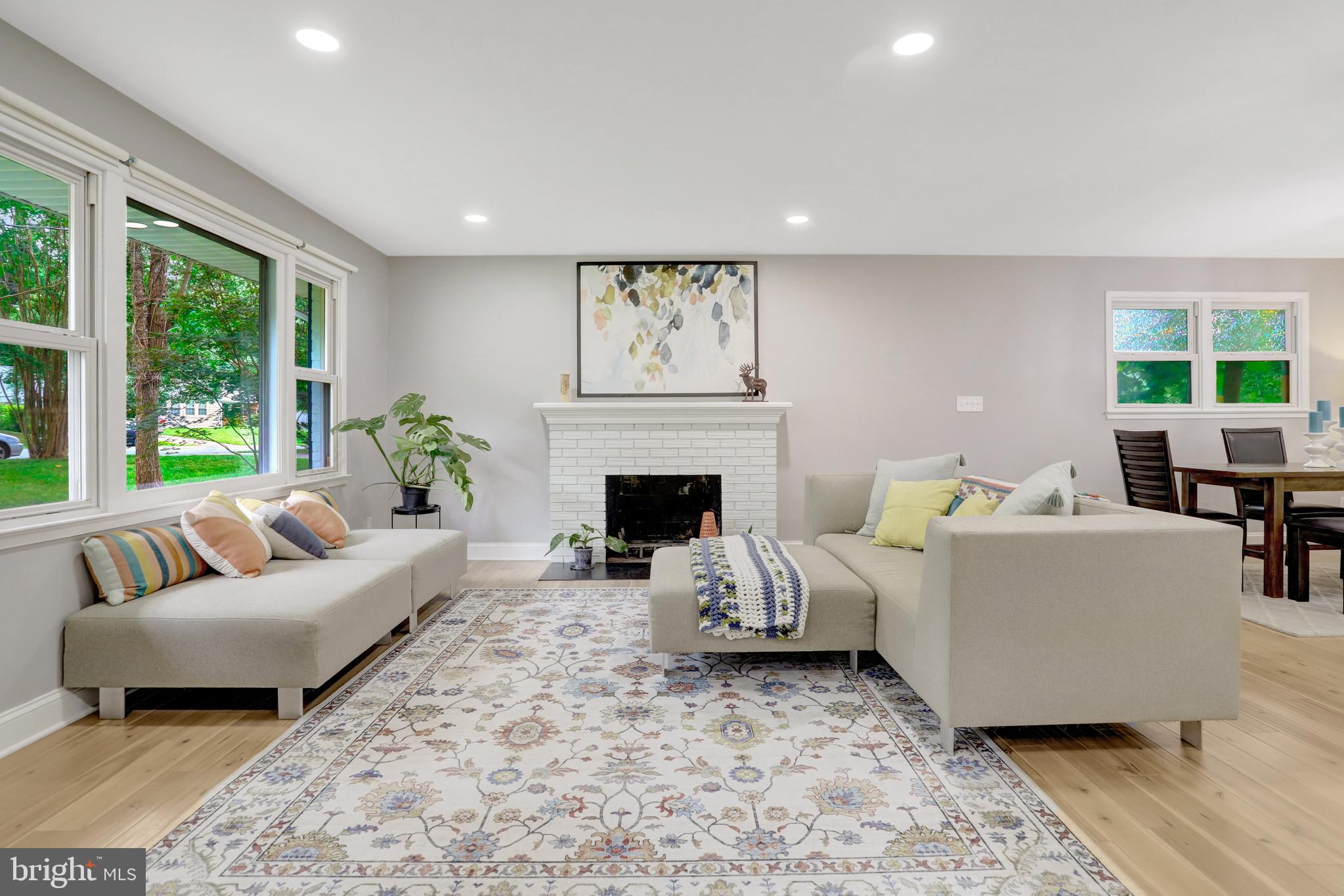 5418 Inverchapel Road Springfield, VA 22151 - Photo 3 of 94 a living room with furniture and a fireplace