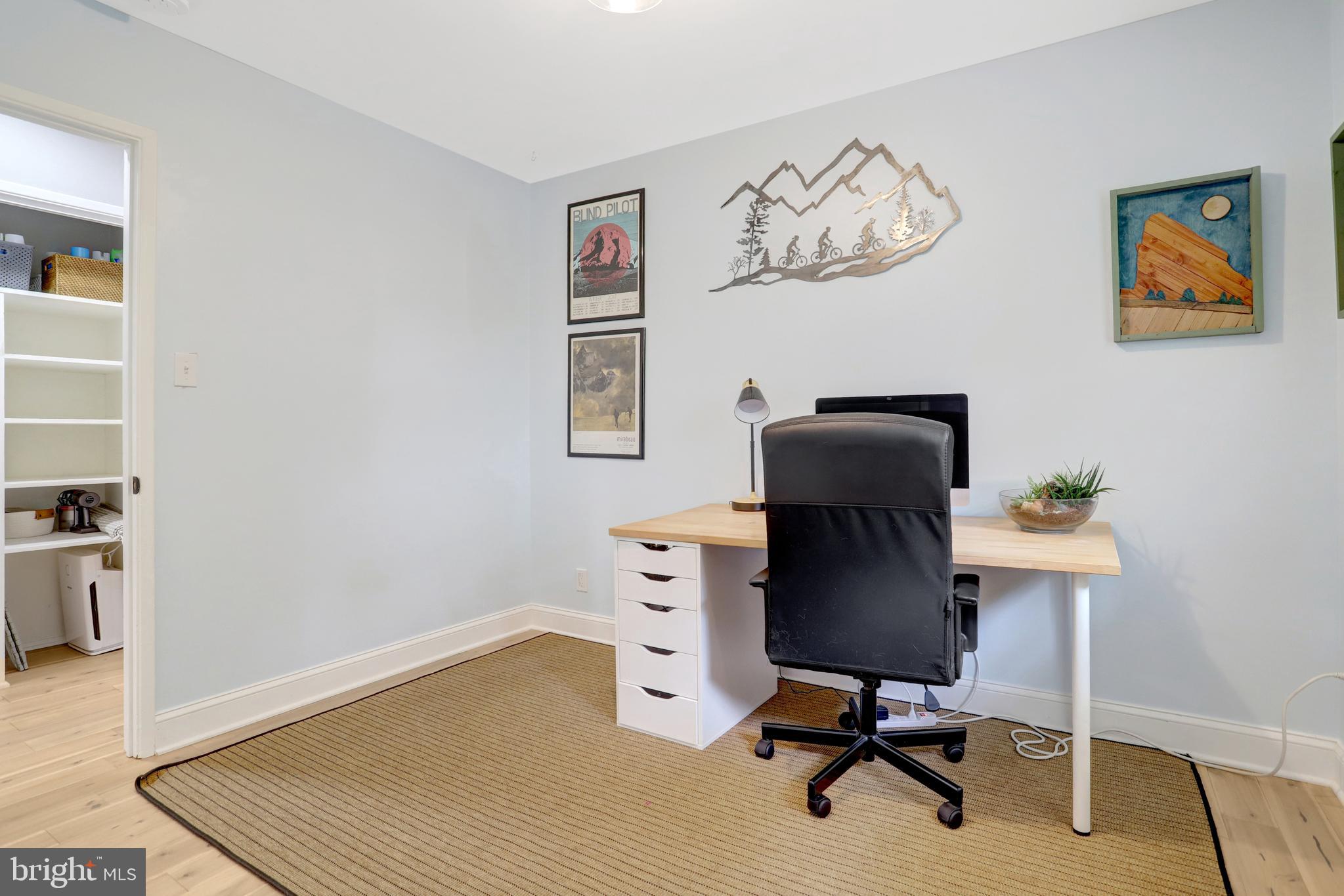 5418 Inverchapel Road Springfield, VA 22151 - Photo 35 of 94 a view of a workspace with furniture and a window